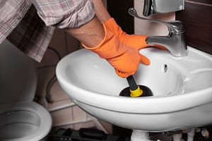 Using plunger correctly on bathroom sink to unclog drain
